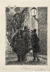 Dos hombres en la calle en la oscuridad