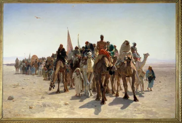 Peregrinos yendo a La Meca Caravana de viajeros en camellos en el desierto