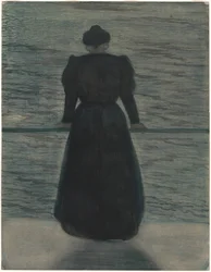 Mujer junto al mar