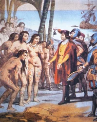 Cristóbal Colón desembarca en el Nuevo Mundo en 1492 y es recibido por los indios taínos