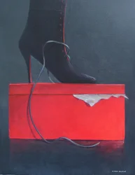 Bota en una caja roja