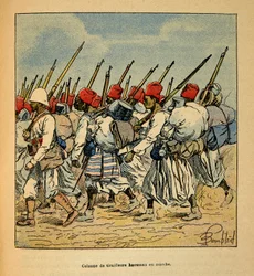 La Guerra en Madagascar - Historia anecdótica de las expediciones francesas de 1885-1895 por Henri Galli, ilustrado por Louis Bombled: Columna de tiradores Haoussas marchando en 1895