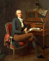 Retrato de hombre sentado en su escritorio