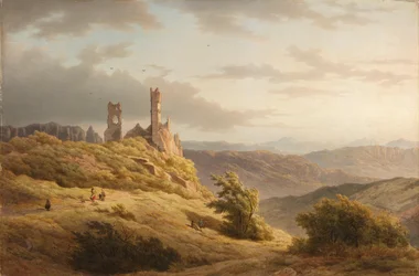 Paisaje montañoso con una ruina
