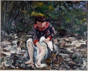 Niña en el arroyo