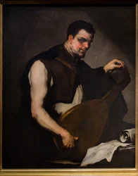 Músico afinando su laúd
