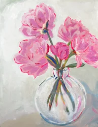 Jarrón de cristal con flores rosas