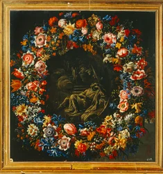 Corona de flores con, en el centro, una escena bíblica