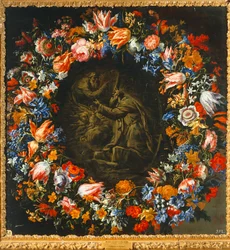 Corona de flores con, en el centro, una escena bíblica