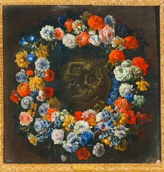 Corona de flores con, en el centro, una escena bíblica