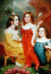 Tres niños en un interior