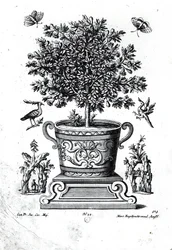 Árbol ornamental en una urna sobre un pequeño escenario