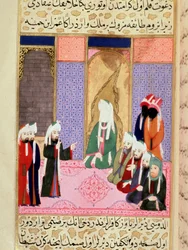 El profeta Mahoma, con el rostro cubierto, probablemente conversando con su compañero Omar u Omar I, apodado Al-Farouq (Al Farouq o Faruq). Miniatura tomada del poema épico «Siyer-i Nebi» (Siyer i Nebi), que relata la vida del profeta Mahoma