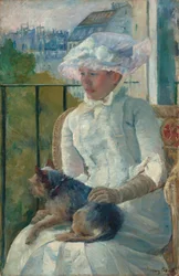 Niña joven en una ventana