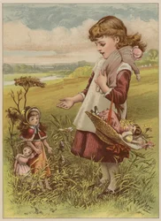 Niña llevando a sus muñecas a pasear