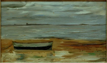 Playa con bote gris y mar gris