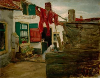 Esquina de pueblo holandés con ropa tendida