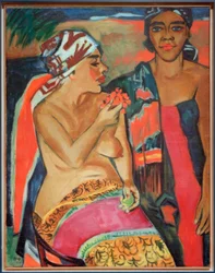 Mujeres con alfombras de colores