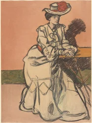 Una elegante parisina sentada en un café