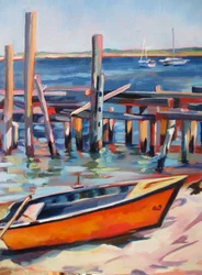 Barco naranja en el muelle