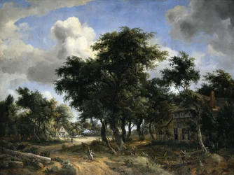 Camino de pueblo bajo los árboles