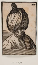 Busto de hombre con barba y turbante, perfil 3/4 hacia la derecha