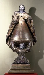 San Francisco sosteniendo a la Virgen y el Niño