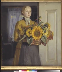 Una niña con girasoles