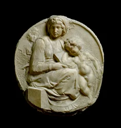 Virgen y Niño con San Juan Bautista niño Madonna Pitti o Tondo Pitti. Relieve de mármol por Michelangelo Buonarroti conocido como Michelangelo