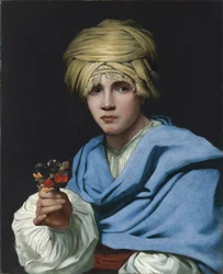 Niño con turbante sosteniendo un ramillete
