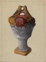 Urna de yeso con frutas y pájaros