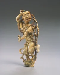 Figura de Kui xing (marfil tallado)