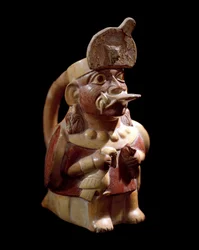 Vasija antropomorfa representando a un sacerdote sacrificando dos animales (arte precolombino, civilización Moche, 200 a.C.-700 d.C., Lima, Museo Nacional de Antropología y Arqueología)