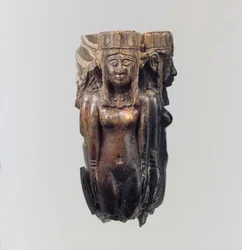 Mango de abanico o matamoscas en forma de cuatro figuras femeninas, c. siglo VIII-VII a.C. (marfil)
