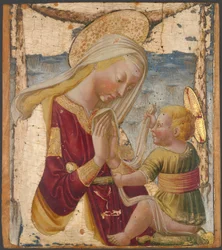 La Virgen adorando a la niña