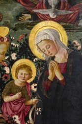 La Virgen María, San Juan y dos ángeles adorando al Niño Jesús