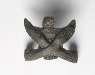 Montura de bronce de un "Paquete Shawabty": Brazos cruzados, finales de la 18ª a principios de la 19ª Dinastía, circa 1336-1256 a.C.
