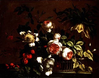 Rosas, peonías y otras flores en un borde