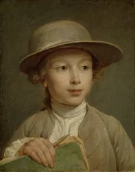Niño con un cuaderno de dibujo
Niño con un cuaderno de dibujo