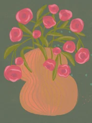Flores rosas en un jarrón naranja