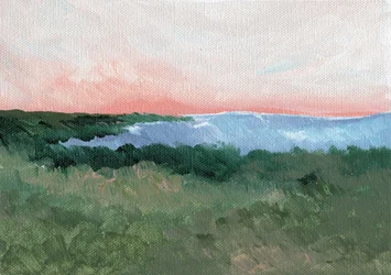 Vista costera con cielo rosado