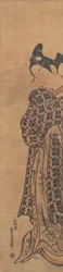 El actor Sanogawa Ichimatsu como un joven sosteniendo una carta doblada, ca. 1765