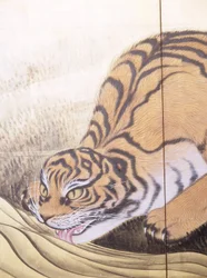 Tigres en un paisaje