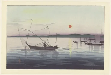 Barcos de pesca al atardecer