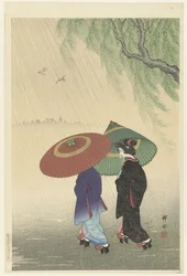 Dos mujeres bajo la lluvia
