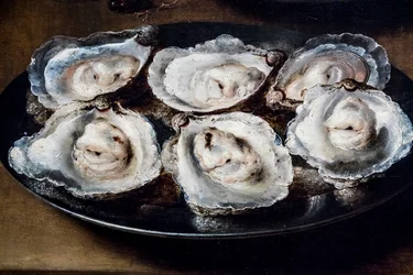 Bodegón con ostras y pastelería