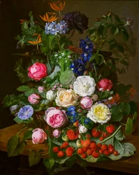 Una cesta con rosas y otras flores