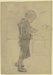Victor Scholderer de pie ante un escritorio