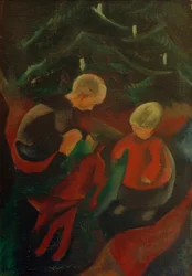 Dos niños bajo el árbol de Navidad
