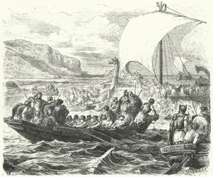 Barcos fenicios desembarcando en una costa